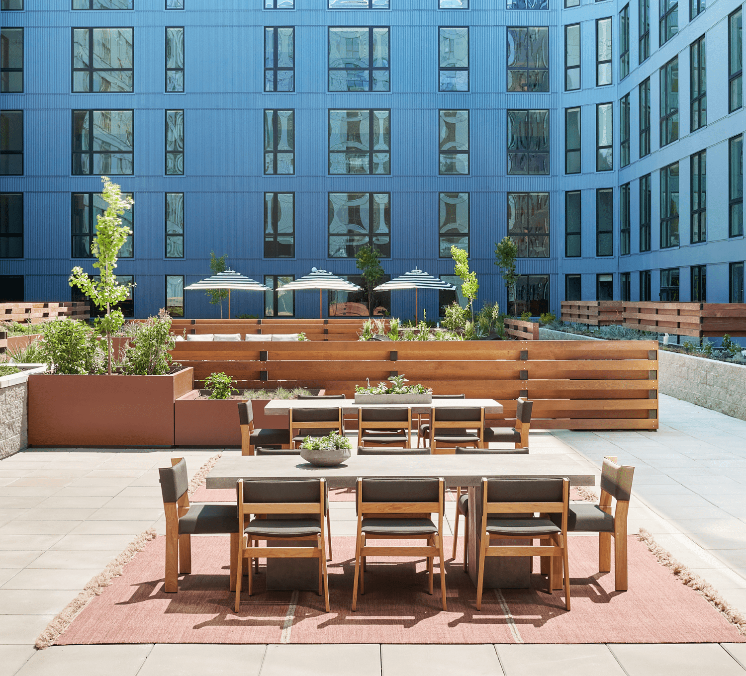Courtyard patio deck with tables and seating.